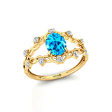 Flower Inspired Ring with Oval Shaped Swiss Blue Topaz and Accent Diamonds - GeumJewels