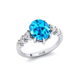 Oval Cut Swiss Blue Topaz with Graduated Diamonds Ring - GeumJewels