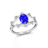 Flower Inspired Ring with Oval Shaped Tanzanite and Accent Diamonds - GeumJewels