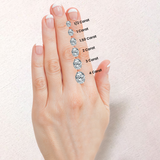 Flower Inspired Ring with Oval Shaped Lab Diamond and Accent Diamonds - GeumJewels