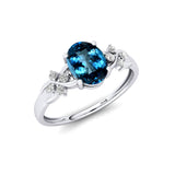 Criss Cross Diamond Ring with Oval Cut London Blue Topaz