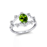 Flower Inspired Ring with Oval Shaped Peridot and Accent Diamonds