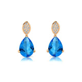 Illussion Set Diamond Earrings with Pear Cut Swiss Blue Topaz