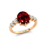 Oval Cut Garnet with Graduated Diamonds Ring