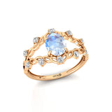 Flower Inspired Ring with Oval Shaped Moonstone and Accent Diamonds