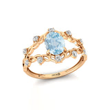 Flower Inspired Ring with Oval Shaped Aquamarine and Accent Diamonds