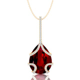 Teardrop Shaped Ruby Pendant Wrapped with Diamond Loop