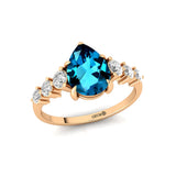 Pear Cut London Blue Topaz with Graduated Diamonds Ring