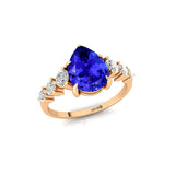 Pear Cut Tanzanite with Graduated Diamonds Ring