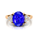 Trio Diamond Engagement Ring with Oval Cut Tanzanite