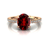 Oval Solitaire Garnet with Accent Diamonds Engagement Ring