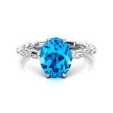 Oval Solitaire Swiss Blue Topaz Ring with Twisted Wire Diamond Band