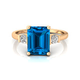 Emerald Cut Swiss Blue Topaz and Diamond Three Stone Ring