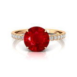 Classic Six Prong Round Solitaire Ruby Ring with Accent Diamond Band