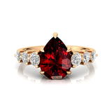 Pear Cut Garnet with Graduated Diamonds Ring