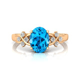 Criss Cross Diamond Ring with Oval Cut Swiss Blue Topaz