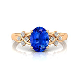 Criss Cross Diamond Ring with Oval Cut Blue Sapphire