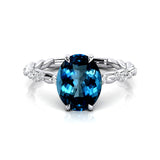 Oval Solitaire London Blue Topaz Ring with Twisted Wire Diamond Band