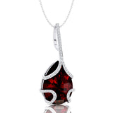 Teardrop Shaped Garnet Pendant Wrapped with Diamond Loop