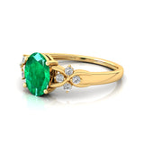 Criss Cross Diamond Ring with Oval Cut Emerald