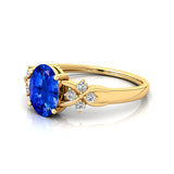 Criss Cross Diamond Ring with Oval Cut Blue Sapphire