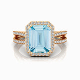 Halo Set Emerald Shaped Aquamarine Split Shank Ring with Accent Diamonds