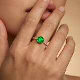 Classic Six Prong Round Solitaire Emerald Ring with Accent Diamond Band