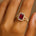 Halo Set Emerald Shaped Garnet Split Shank Ring with Accent Diamonds - GeumJewels