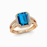 Halo Set Emerald Shaped London Blue Topaz Split Shank Ring with Accent Diamonds