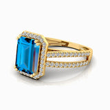 Halo Set Emerald Shaped London Blue Topaz Split Shank Ring with Accent Diamonds