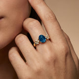 Criss Cross Diamond Ring with Oval Cut London Blue Topaz