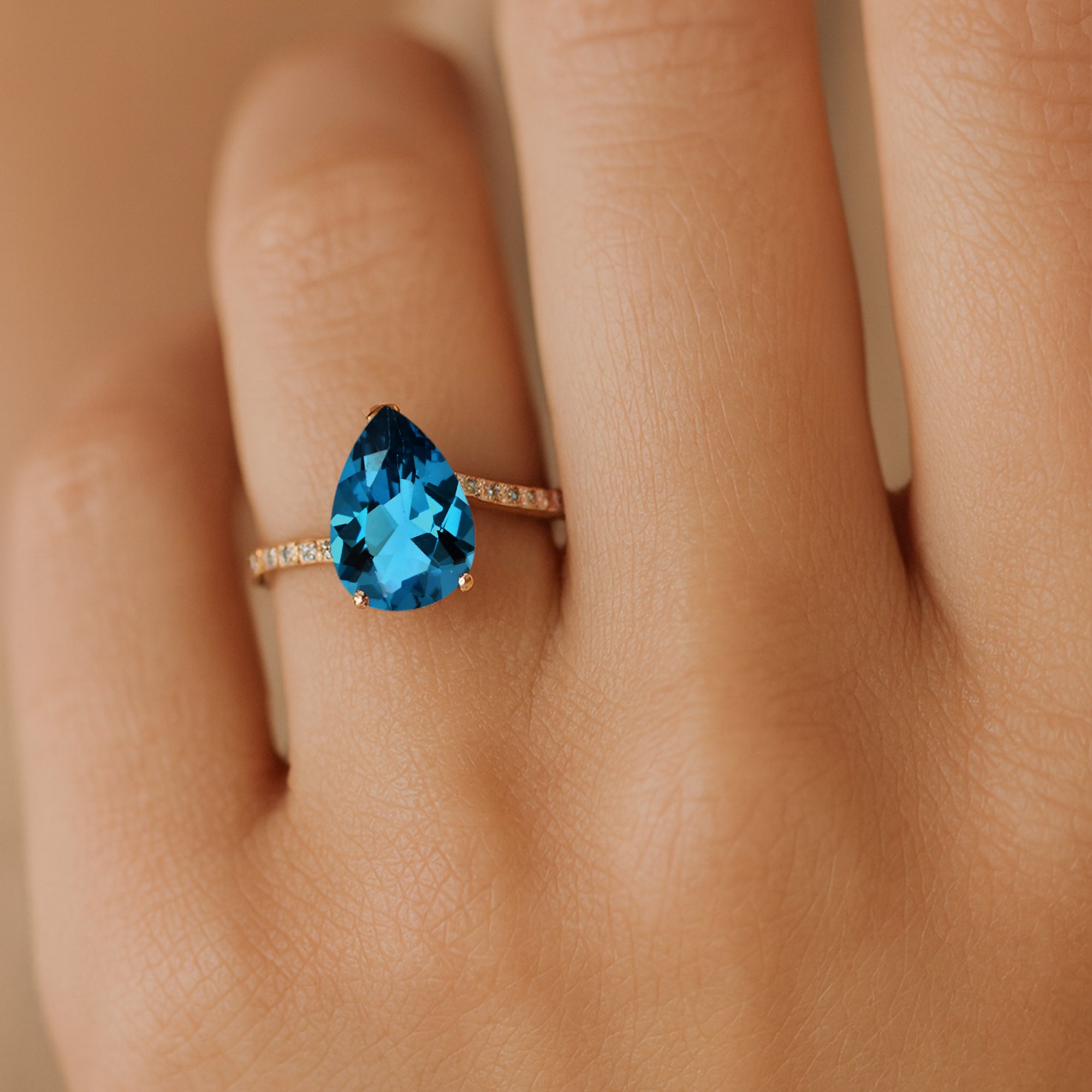 Twisted Up Down Band Pear Shaped London Blue Topaz Ring with Accent Diamonds - GeumJewels