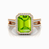 Halo Set Emerald Shaped Peridot Split Shank Ring with Accent Diamonds