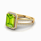 Halo Set Emerald Shaped Peridot Split Shank Ring with Accent Diamonds