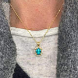 Vintage Style Oval Shaped Paraiba Tourmaline Halo Set with Diamond Accents