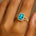 Halo Set Emerald Shaped Paraiba Tourmaline Split Shank Ring with Accent Diamonds - GeumJewels