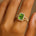 Halo Set Emerald Shaped Peridot Split Shank Ring with Accent Diamonds - GeumJewels