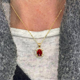 Vintage Style Oval Shaped Ruby Halo Set with Diamond Accents