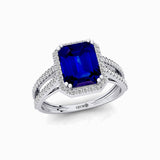 Halo Set Emerald Shaped Blue Sapphire Split Shank Ring with Accent Diamonds