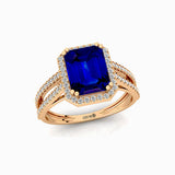 Halo Set Emerald Shaped Blue Sapphire Split Shank Ring with Accent Diamonds