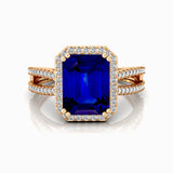 Halo Set Emerald Shaped Blue Sapphire Split Shank Ring with Accent Diamonds