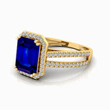 Halo Set Emerald Shaped Blue Sapphire Split Shank Ring with Accent Diamonds