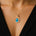 Designer Diamond Loop Pendant with Teardrop Shaped Swiss Blue Topaz - GeumJewels