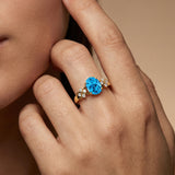 Criss Cross Diamond Ring with Oval Cut Swiss Blue Topaz