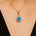 Classic Solitaire Round Swiss Blue Topaz Halo Diamond Dangle Pendant - GeumJewels
