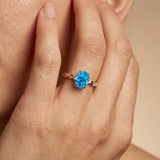Oval Solitaire Swiss Blue Topaz Ring with Twisted Wire Diamond Band