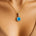 Dainty Round Solitaire Halo Diamond Swiss Blue Topaz Pendant - GeumJewels