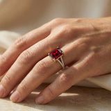 Emerald Cut Garnet Split Shank Engagement Ring with Diamonds