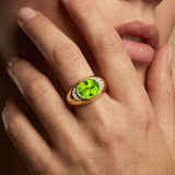 Classic Dome Shaped Diamond Oval Cut Peridot Ring