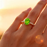 Oval Solitaire Peridot with Accent Diamonds Engagement Ring